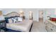 Serene main bedroom features a plush bed, neutral tones, and access to ensuite bathroom at 5304 Maywood Dr, Whitestown, IN 46075
