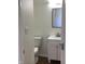 Well-lit bathroom with a vanity and a mirror offering a clean and functional space at 6070 Southbay Dr, Indianapolis, IN 46250