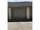 Attached garage with house number 6070 and tan siding, offering convenient parking at 6070 Southbay Dr, Indianapolis, IN 46250