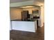 Modern kitchen with stainless steel appliances, dark countertops, and a functional layout at 6070 Southbay Dr, Indianapolis, IN 46250