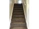 Carpeted staircase leads to the upper level at 6070 Southbay Dr, Indianapolis, IN 46250