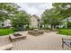 Charming courtyard features a central fountain, brick pavers, and inviting seating areas at 626 N Senate Ave, Indianapolis, IN 46202