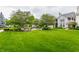 Expansive green space offers a serene environment with manicured lawns and beautiful landscaping at 626 N Senate Ave, Indianapolis, IN 46202