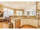 A kitchen with a stainless steel dishwasher, granite countertops, and white cabinets at 626 N Senate Ave, Indianapolis, IN 46202