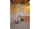 Basement with a sump pump and shelving unit, prepped for moisture management at 6549 Wilshire Pl, Zionsville, IN 46077