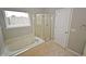 Bathroom with jetted tub and shower at 6549 Wilshire Pl, Zionsville, IN 46077