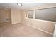 Comfortable loft featuring neutral carpeting and a view of the staircase at 6549 Wilshire Pl, Zionsville, IN 46077