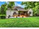 Expansive backyard features a multi-tiered deck, paver patio, and lush lawn at 6672 Braemar S Ave, Noblesville, IN 46062