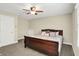 Nicely decorated bedroom with carpeted floors, ceiling fan, and natural lighting at 6672 Braemar S Ave, Noblesville, IN 46062