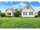 Charming two-story home with manicured lawn, white painted brick, stone accents and beautiful landscaping at 6672 Braemar S Ave, Noblesville, IN 46062