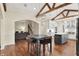 Spacious open-concept kitchen featuring stainless steel appliances, kitchen island, and hardwood floors at 6672 Braemar S Ave, Noblesville, IN 46062