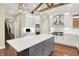 Bright kitchen with a large island, stainless appliances, and hardwood floors at 6672 Braemar S Ave, Noblesville, IN 46062