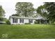 Charming single-story home featuring manicured lawn and traditional curb appeal at 6691 S County Road 350 W, Clayton, IN 46118