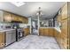 Bright kitchen with wooden cabinets, stainless steel appliances, and ample counter space at 6691 S County Road 350 W, Clayton, IN 46118