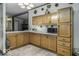 Cozy kitchen space with wooden cabinets and appliances at 6691 S County Road 350 W, Clayton, IN 46118