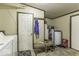 Utility room includes laundry facilities and extra storage; functional and organized at 6691 S County Road 350 W, Clayton, IN 46118