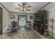 Living room features cozy chairs, cabinet and natural lighting at 6691 S County Road 350 W, Clayton, IN 46118