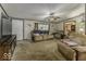 Comfortable living room is furnished with plush couches, television and ample lighting at 6691 S County Road 350 W, Clayton, IN 46118