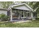 Cozy front porch features a swing and seating area at 6691 S County Road 350 W, Clayton, IN 46118