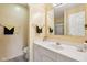 Bathroom with a white vanity, mirror, and neutral color scheme at 6711 Bridgefield Way, Indianapolis, IN 46254