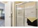 Bathroom featuring a shower with sliding glass doors and neutral walls at 6711 Bridgefield Way, Indianapolis, IN 46254