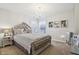 Elegantly designed bedroom with a mirrored bed frame, plush pillows, and sophisticated lighting at 6711 Bridgefield Way, Indianapolis, IN 46254