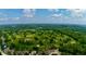 Expansive aerial shot showcasing lush golf course with trees and ponds at 7016 Royal Oakland Way, Indianapolis, IN 46236
