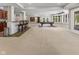 Large finished basement features a bar area and a pool table for entertaining at 7016 Royal Oakland Way, Indianapolis, IN 46236