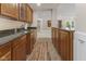 Finished basement features a convenient bar area with ample cabinet space and a sink at 7016 Royal Oakland Way, Indianapolis, IN 46236