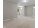 Inviting bedroom features neutral walls, soft carpeting, and ample natural light at 7016 Royal Oakland Way, Indianapolis, IN 46236