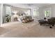 Bright bedroom with neutral decor, carpet, and furniture at 7016 Royal Oakland Way, Indianapolis, IN 46236