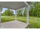 View of the back porch and expansive green backyard at 7248 Covington St, Lebanon, IN 46052