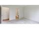 Bright bedroom with soft carpet and two entryways to the bathroom at 7248 Covington St, Lebanon, IN 46052