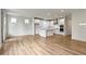 Open living space featuring a kitchen, hardwood floors, and recessed lighting at 7248 Covington St, Lebanon, IN 46052
