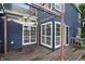 Exterior view of wood deck attached to blue house at 7510 Harbour, Indianapolis, IN 46240
