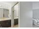 Bathroom featuring double vanity, mirrored closet, and modern fixtures at 7510 Harbour, Indianapolis, IN 46240