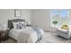 Bedroom featuring a decorative rug, plush bedding and bright natural light at 7510 Harbour, Indianapolis, IN 46240