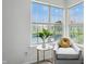 Bright living space featuring cozy seating and a view of the water outside the window at 7510 Harbour, Indianapolis, IN 46240