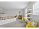 View of carpeted loft with wooden railing, floating shelves, and stylish decor at 7510 Harbour, Indianapolis, IN 46240