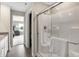 Shower with glass door and white door at 7644 Allesley Dr, Avon, IN 46123
