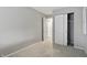 Bedroom featuring neutral carpet, closet with sliding doors, and ample natural light at 7940 Sunfield Ct, Indianapolis, IN 46214
