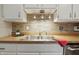 Close up shot of a kitchen sink with stainless steel appliances at 7940 Sunfield Ct, Indianapolis, IN 46214