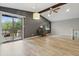 Inviting living room with hardwood floors, sliding doors to outdoor deck at 7940 Sunfield Ct, Indianapolis, IN 46214