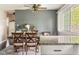 Dining room with wood table, chairs, and neutral decor at 800 E 104Th St, Carmel, IN 46280