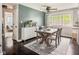 Modern dining room with a stylish table, ample seating, and lots of natural light at 800 E 104Th St, Carmel, IN 46280