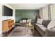 Cozy living room with modern decor, plush sofas, and stylish accents at 800 E 104Th St, Carmel, IN 46280