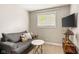 Comfortable living room with modern sofa and window view at 800 E 104Th St, Carmel, IN 46280