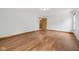 Bedroom featuring hardwood floors, white walls, natural light and wood trim at 8241 Holmard Pl, Indianapolis, IN 46259