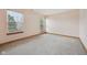 Serene bedroom with neutral walls, soft carpet, bright windows, and ample natural light at 8241 Holmard Pl, Indianapolis, IN 46259