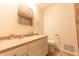 Neutral bathroom featuring a vanity, toilet, and shower with a curtain at 8772 W Evergreen Dr, Columbus, IN 47201